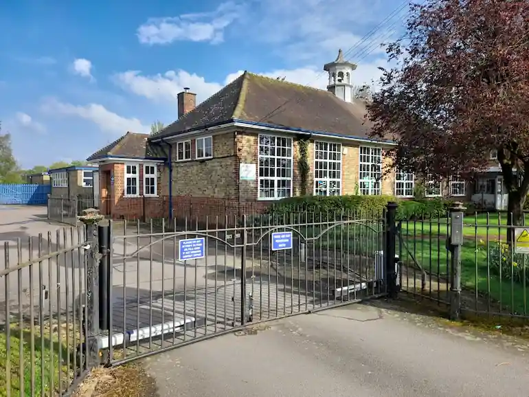 Photograph of the entrance gates to Widford Primary School